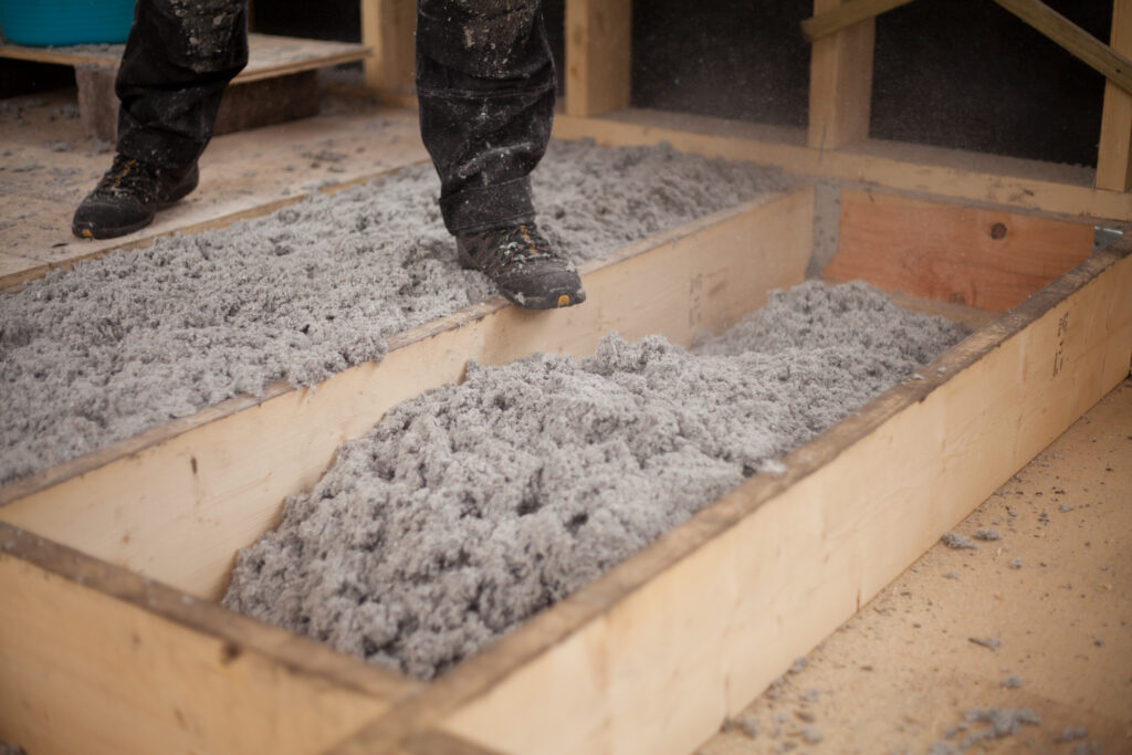 Loose cellulose insulation installed in the floor